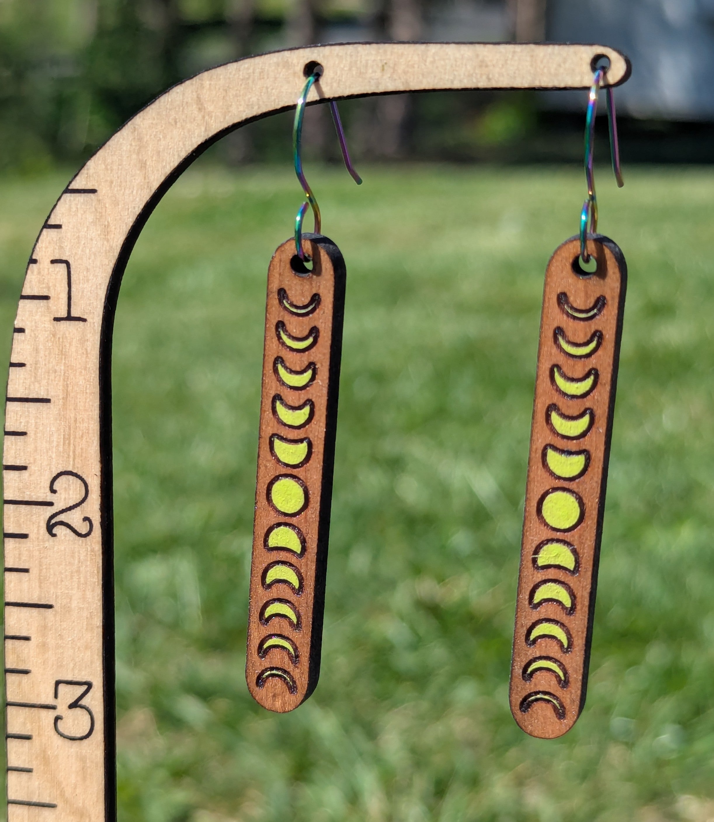moon phases bar dangle - neon green